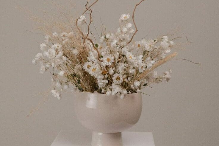 Dried Daisies Hazel Branches Wabi Sabi Loose Flowers Centerpiece and Vase Arrangement e1731932354871 uai Love Spell Design